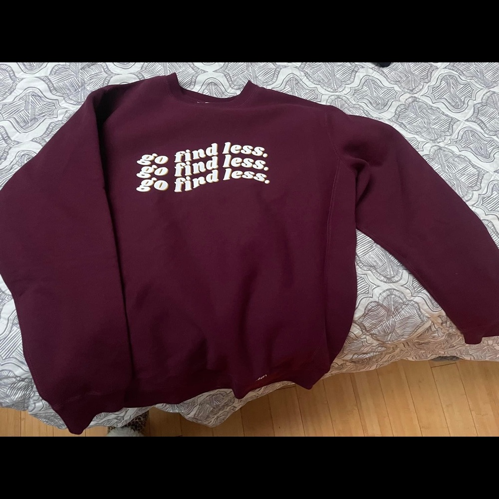 Elyse Myers “Go Find Less” crewneck sweatshirt